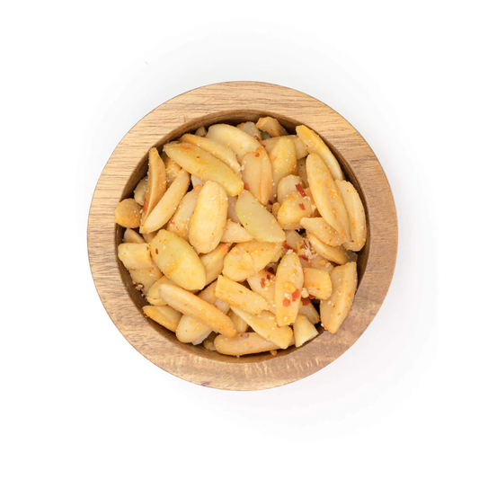 Superfood Pili Nuts With Spicy Chili Pepper Wood Bowl Of Pili Hunters Healthy Snack