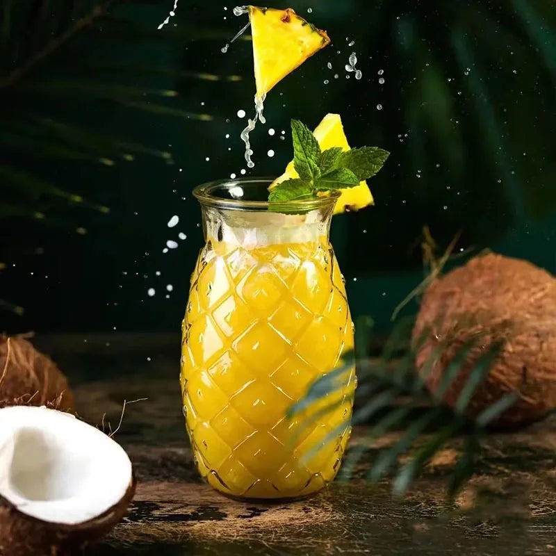 Coconut Pineapple Fruit Drink In Tropical Style Barware Cocktail Glasses And Smoothie Cup Shaped Like Pineapple